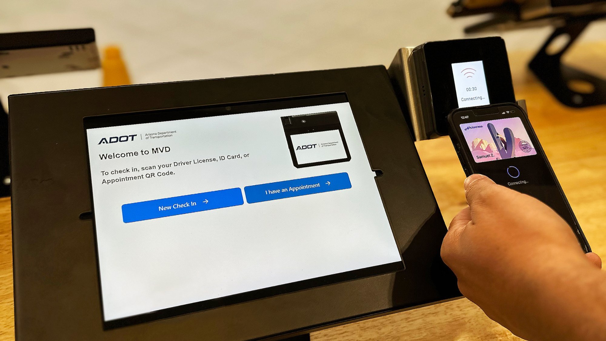 An individual using a digital device ADOT